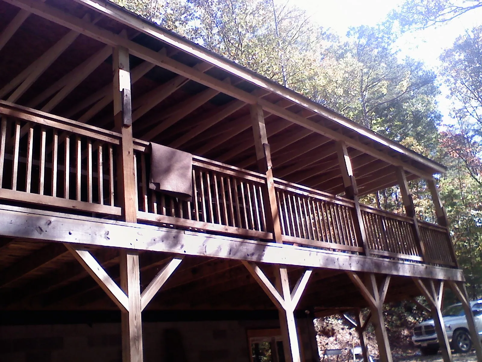Timber framing under a new elevated porch and deck — Roof Leak Repair in Hollow Rock by Roofing Brothers